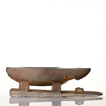 Bertil Vallien, a sand cast glass sculpture of a boat on stand, Kosta Boda, Sweden.