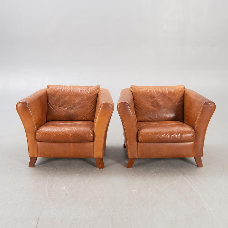 A pair of Lederland leather armchairs Netherlands later part of the 20th century.