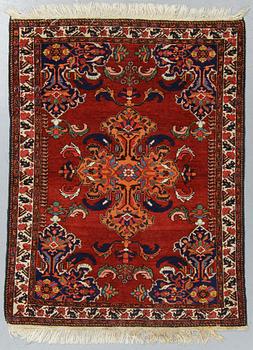 A rug, semi-antique Hamadan, ca 140 x 110 cm.