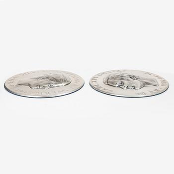 Relief, a pair, silver 999/1000, numbered 456 and 457/3000, Lagerströms Silver AB, Norrtälje 1976.