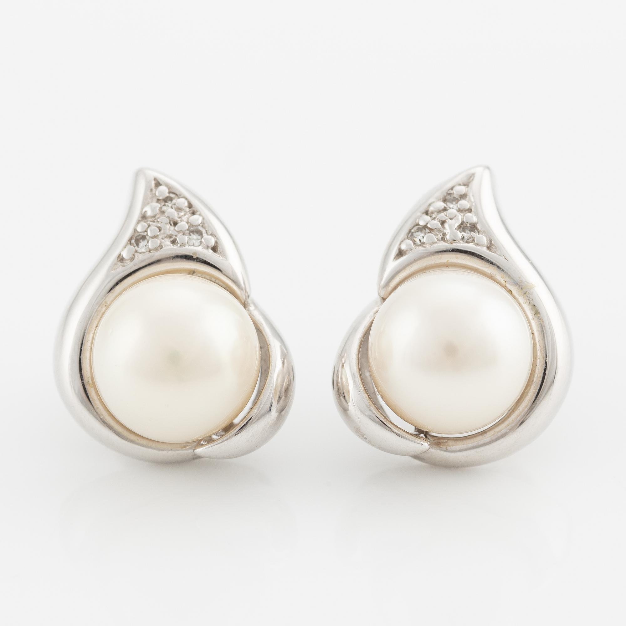 Earrings, 18K white gold with cultured pearls and small diamonds.