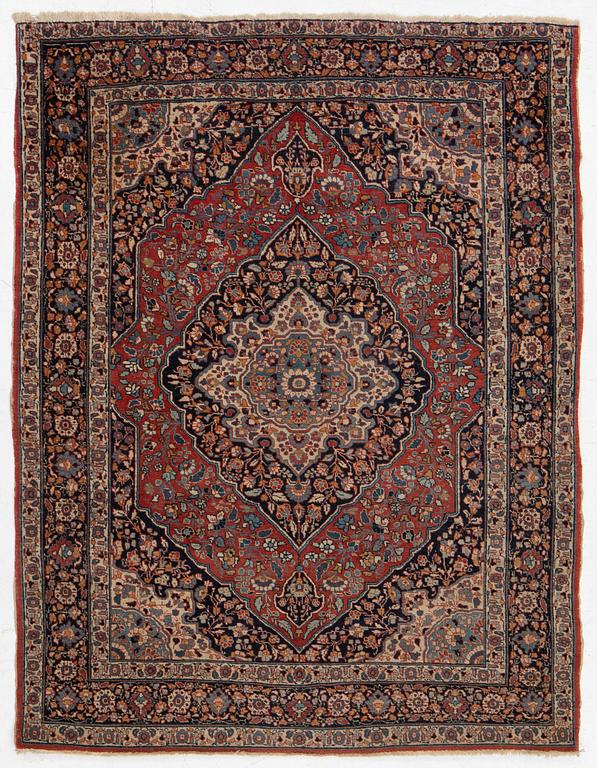 An oriental rug, c. 180 x 140 cm.