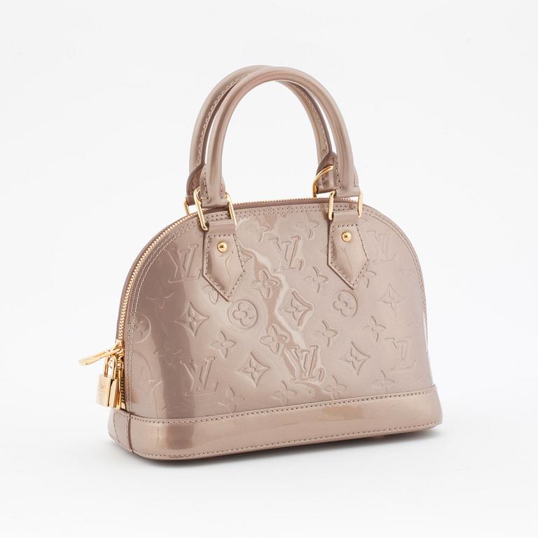 LOUIS VUITTON, a powder pink vernis top handle bag with a detachable Louis Vuitton charm, "Alma".