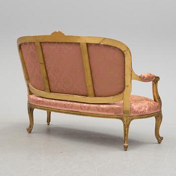 a rococo-style sofa from around 1900.