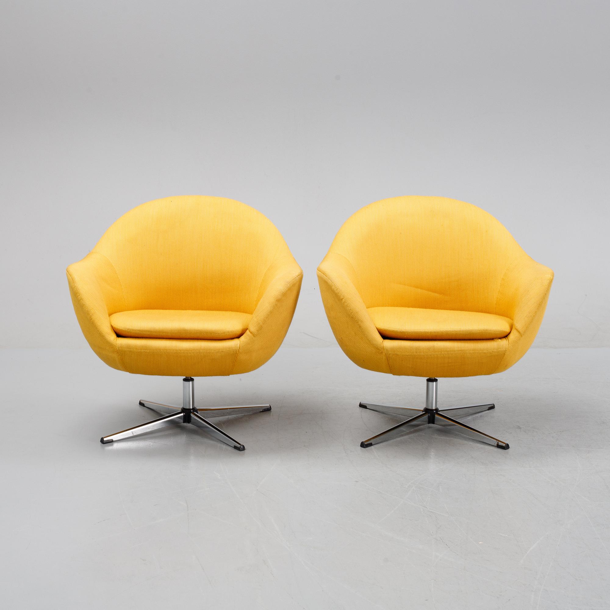 A pair of easy chairs, mid 20th Century.