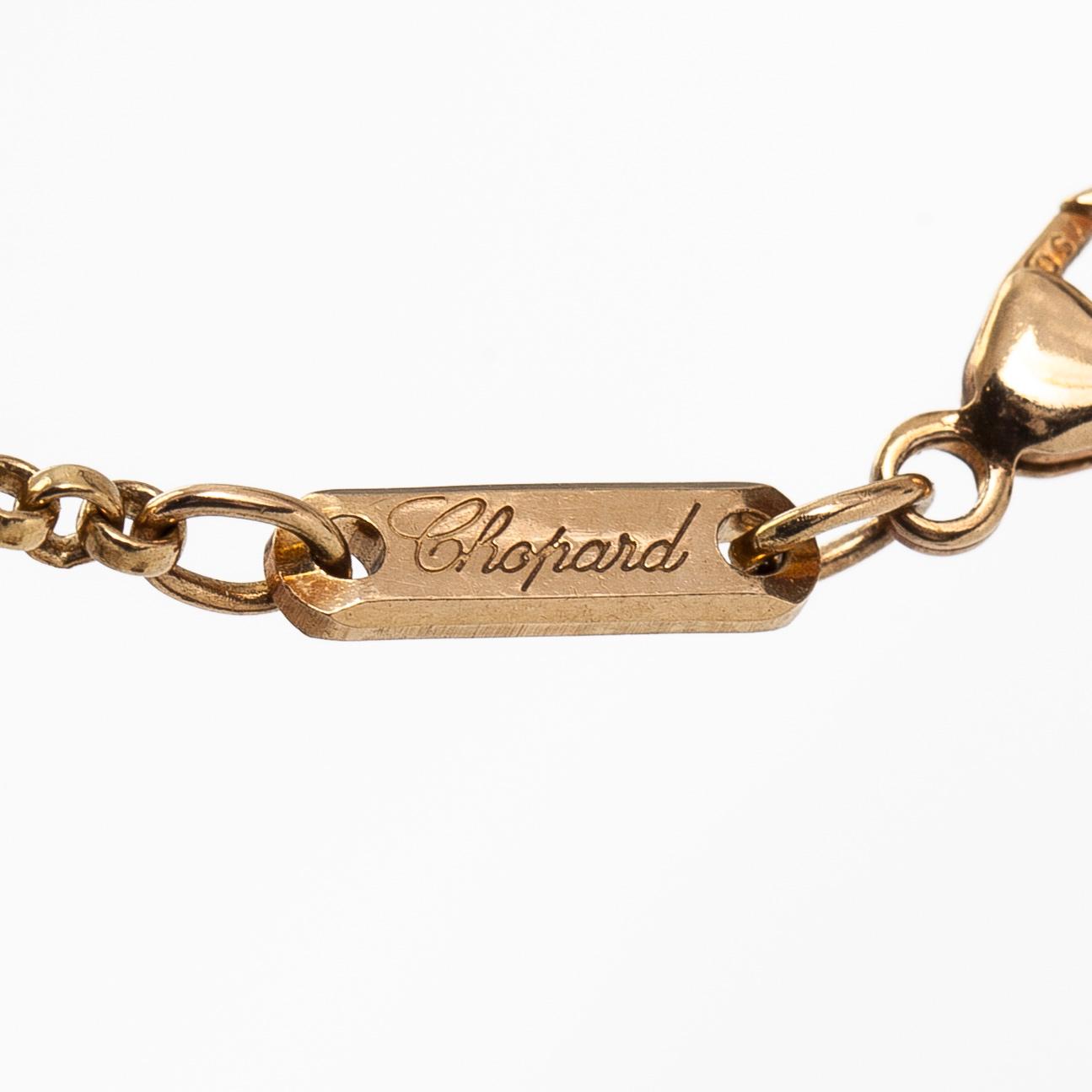 Chopard, an 18K gold 'Happy Diamonds Teddy Bear' pendant necklace.