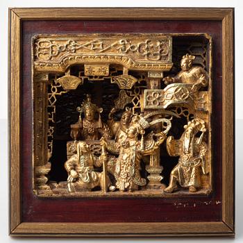 A Chinese wooden panel in deep relief, Qing dynasty, 19th century.