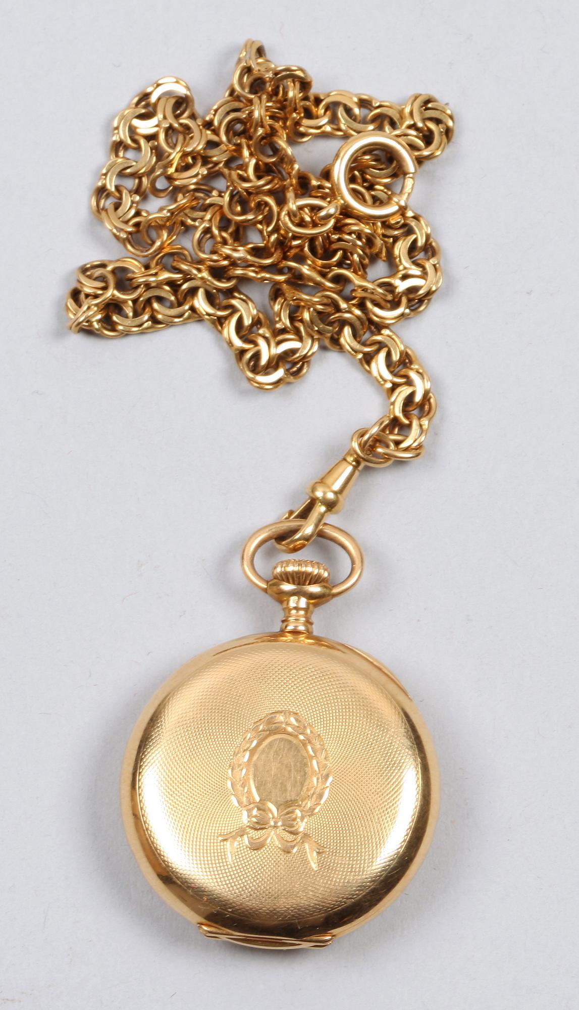 DAMFICKUR MED KEDJA, 18 K guld, kedjans vikt 17g.
