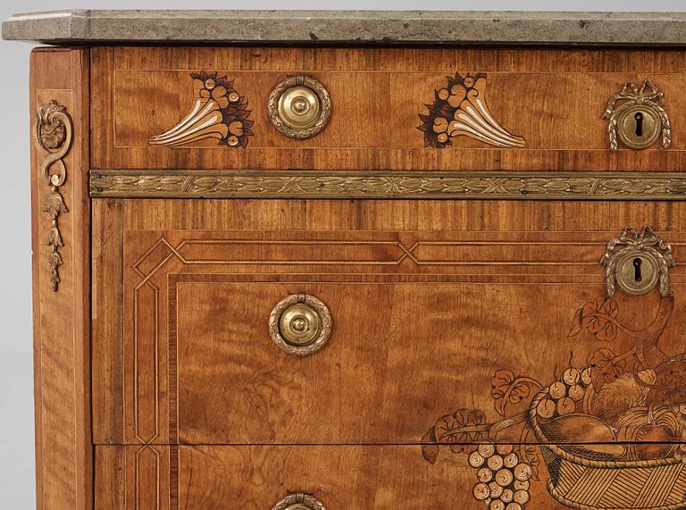 A matched pair of Gustavian ormolu-mounted limestone topped and marquetry commodes by C. Lindborg, late 18th century.