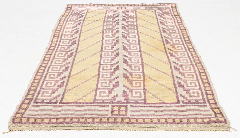 An Art Déco Pile Rug, 1930s. Circa 237 x 112 cm.