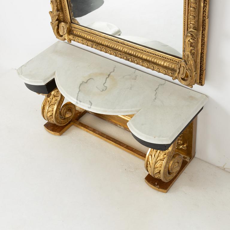 A mirror with console table, late 19th century.