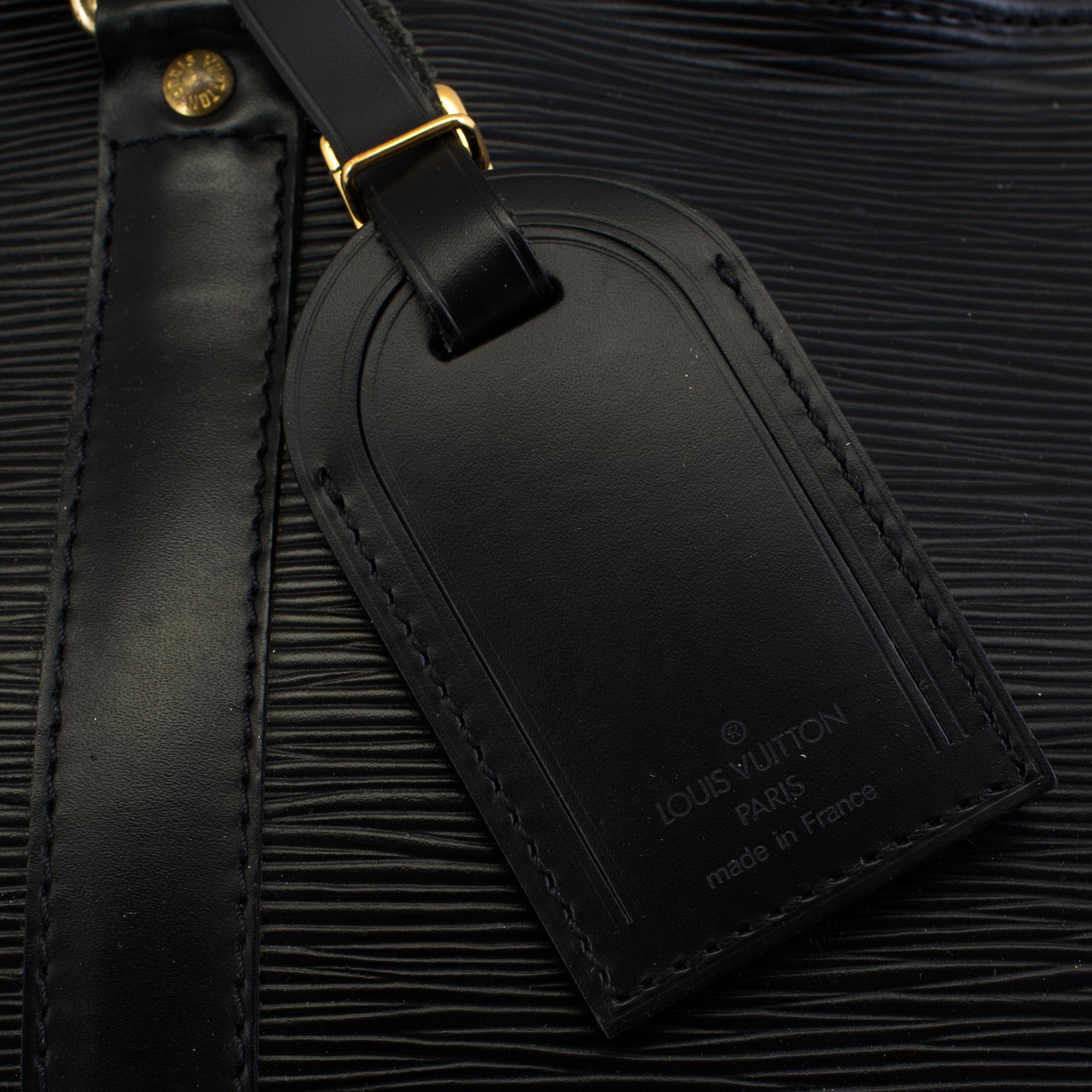 A Louis Vuitton weekend bag  "Keepall 50 Epi Black".
