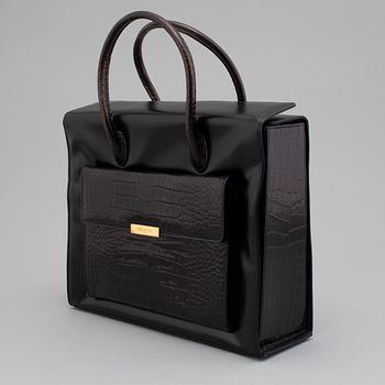 an Escada leather bag.