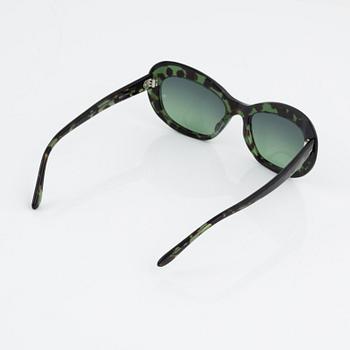 Oliver Goldsmith, a pair of sunglasses.