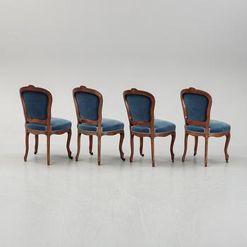 A sofa and a set of four chairs, Rococo revival, late 19th century.