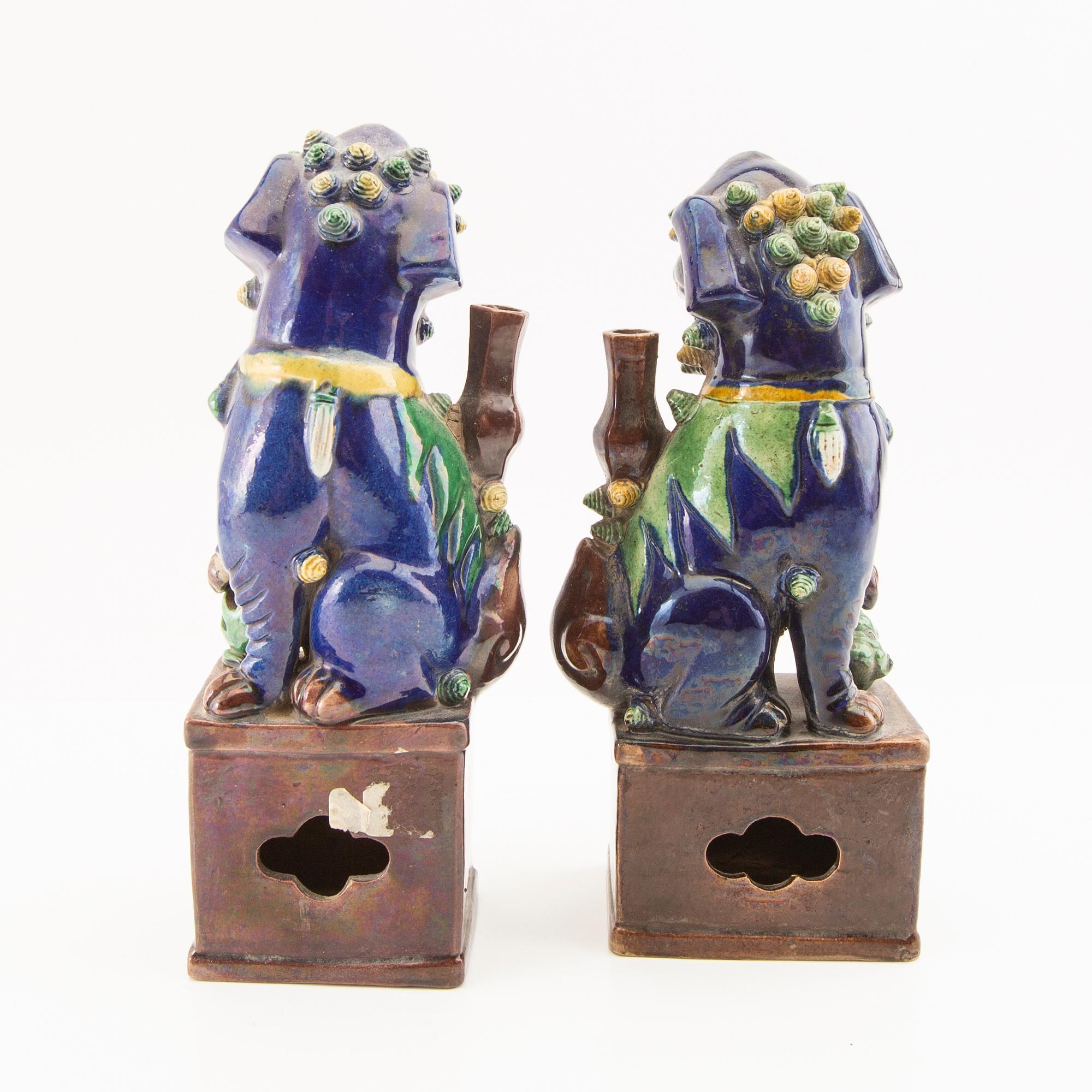 A pair of Chinese Joss stick holders, late Qing dynasty/early 20th Century.