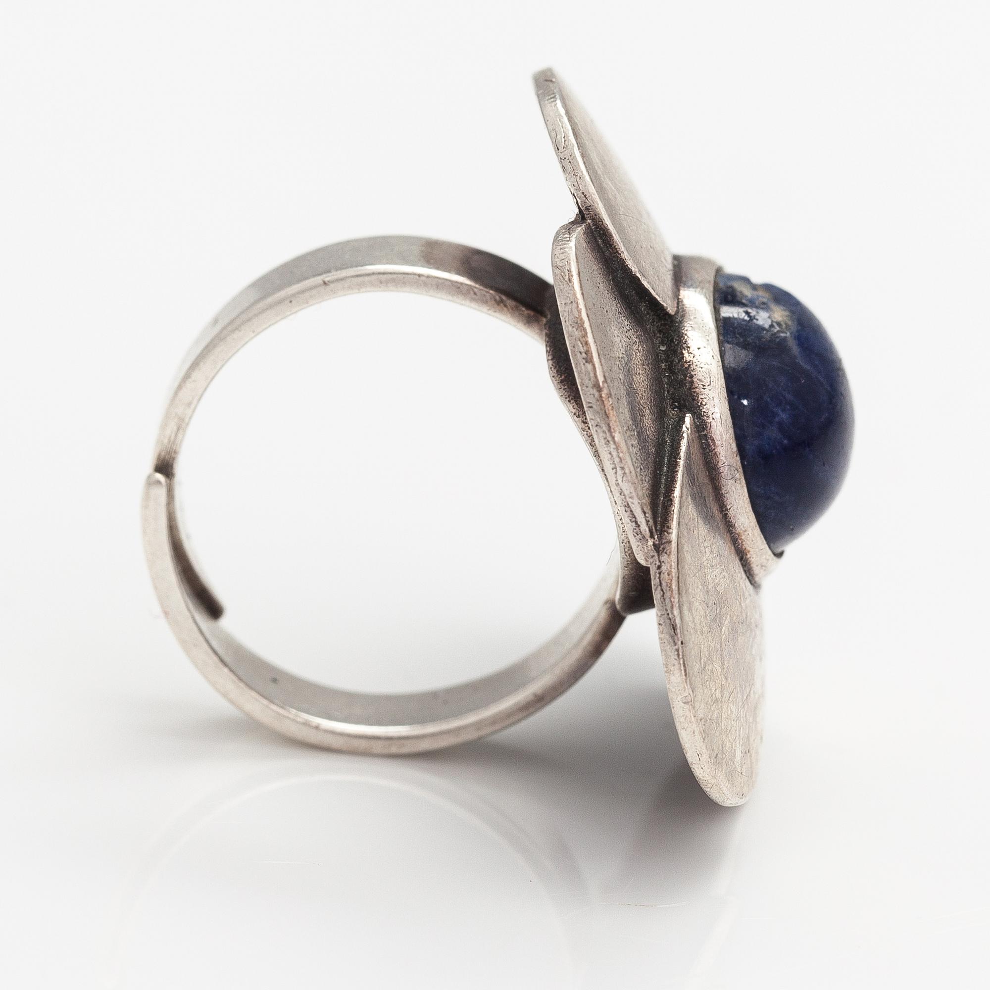Eila Minkkinen, A sterling silver ring "Wild rose" with a sodalit. Kalevala Koru, Helsinki 1973.