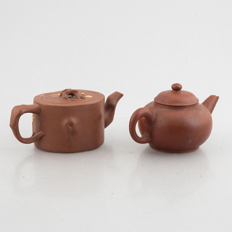 Two Chinese Yixing ware teapots, 20th century.