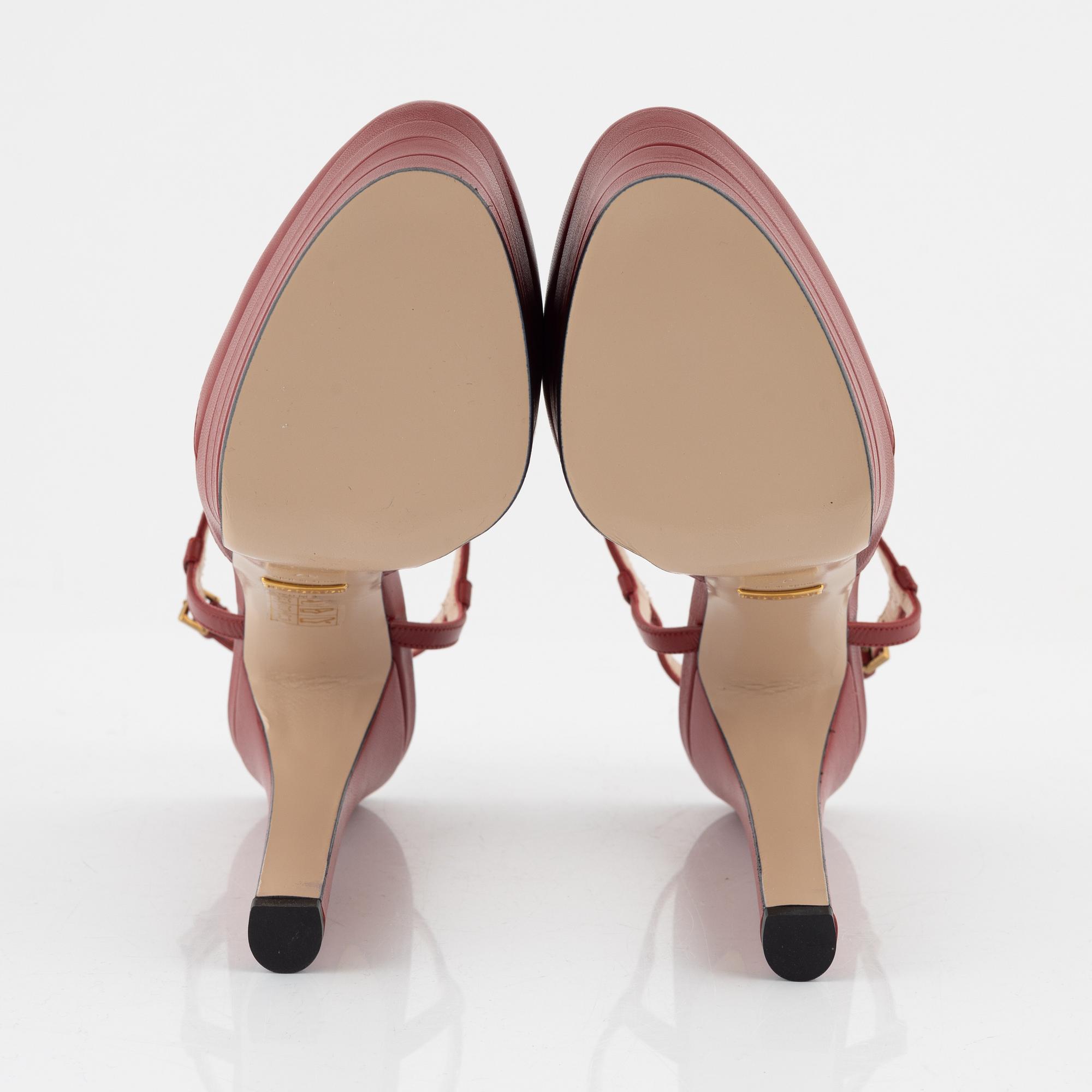 Gucci, a pair of red leather high heel shoes, 2016, size 37.