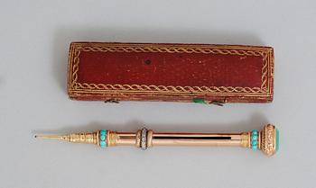 A 19th century probably French gold pen-holder.