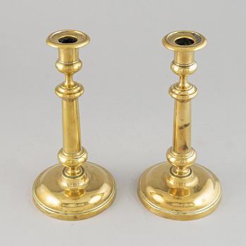 A pair of bronze Rmpire candlesticks, first half of he 19th century.