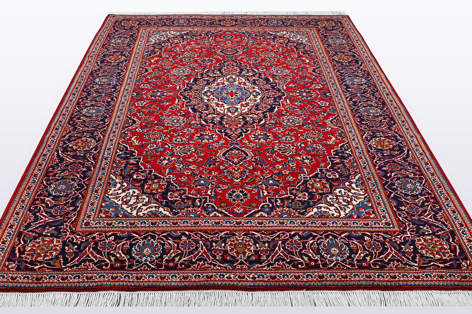 A carpet, Kashan, 308 x 202 cm.