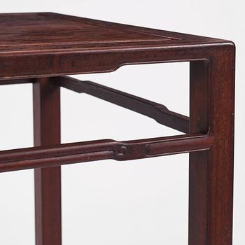 A Chinese hardwood corner-leg table, Qing dynasty.