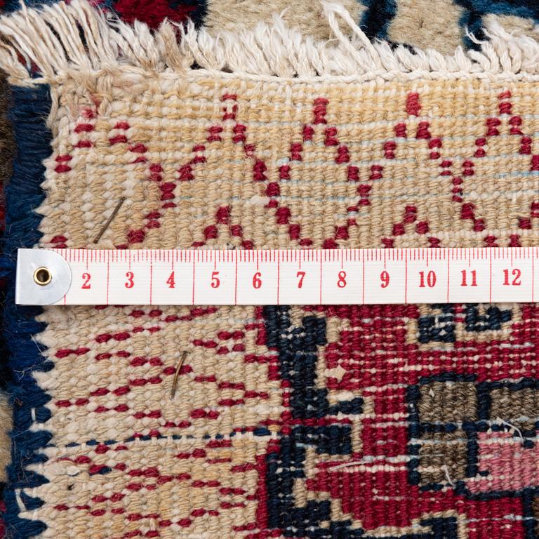 A semi-antique Meshad carpet, signed Saber, c. 369.5 x 300 cm.