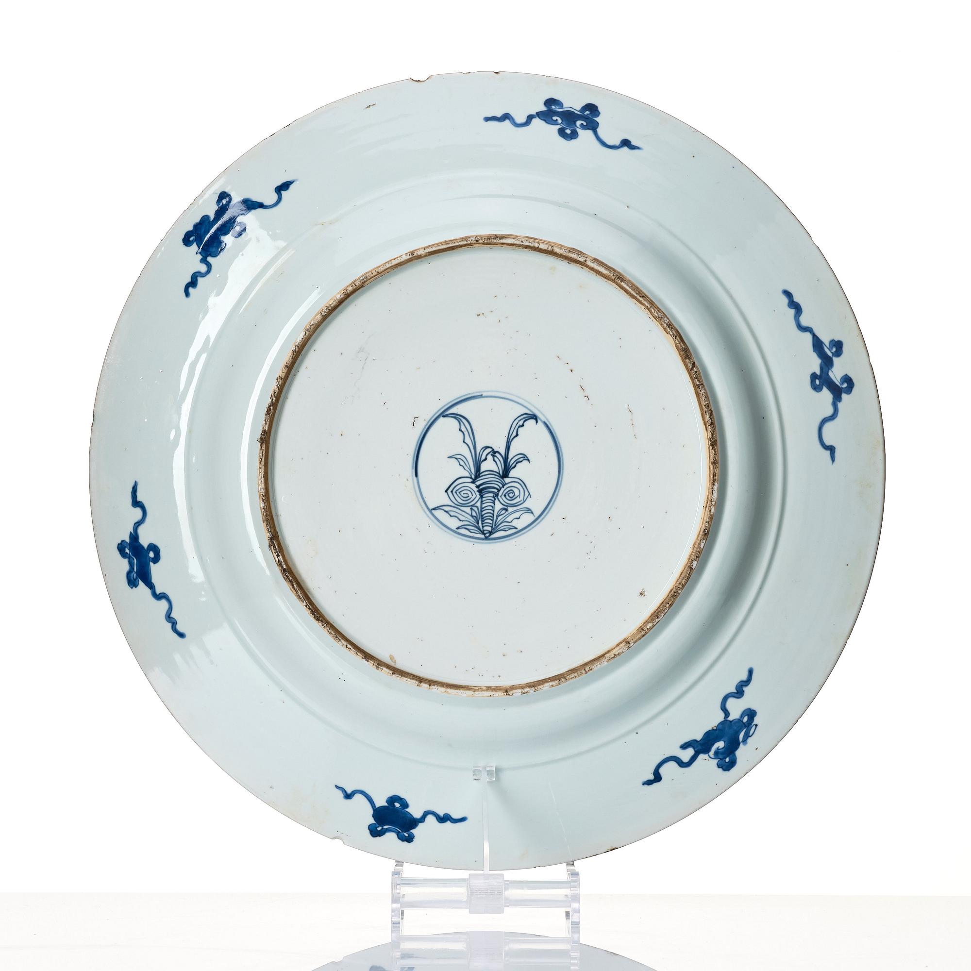 A massive blue and white 'peacock' charger, Qing dynasty, early 18th century.