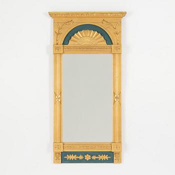 An Empire style mirror, first half of the 20th Century.