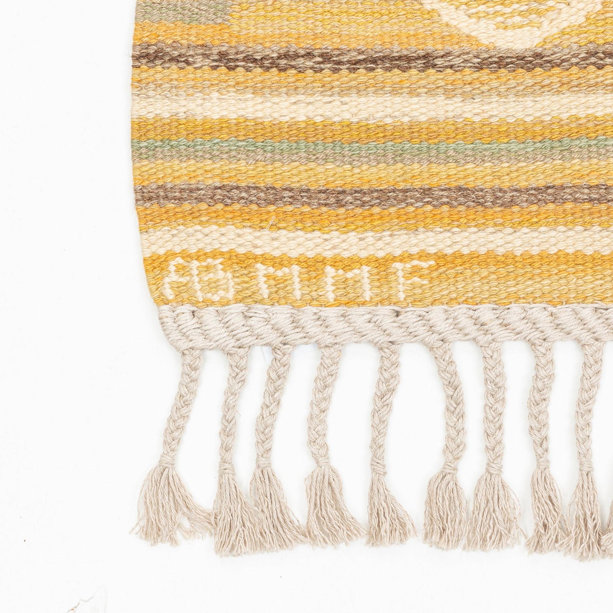 Barbro Nilsson, a carpet, "Spättan, gul", flat weave, ca 269 x 146 cm, signed AB MMF BN.