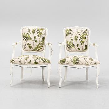 A pair of Rococo style armchairs, 20th century.