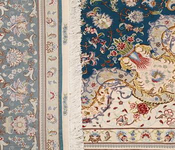 A part silk Tabriz carpet, so-called 50 Raj, approx. 306 x 200 cm.