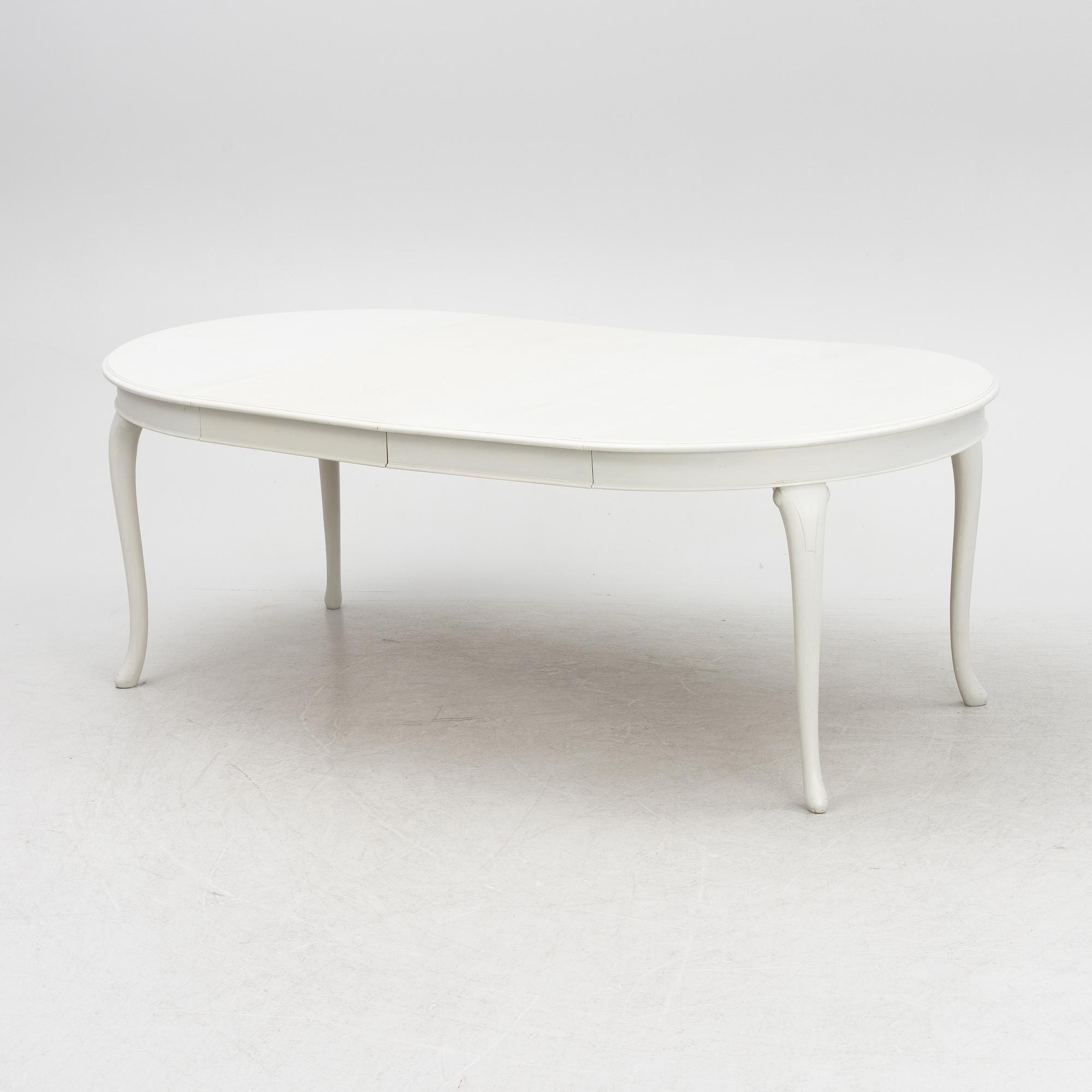 A Rococo style dining table, late 20th century.