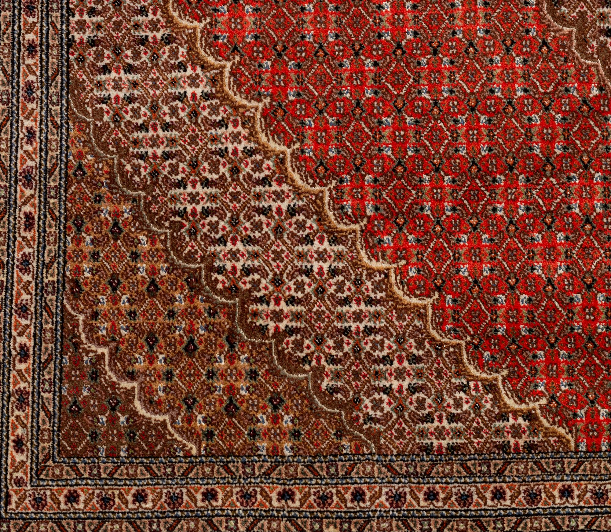 A carpet, Tabriz, part silk, 40-50 Radj, ca 300 x 195 cm.