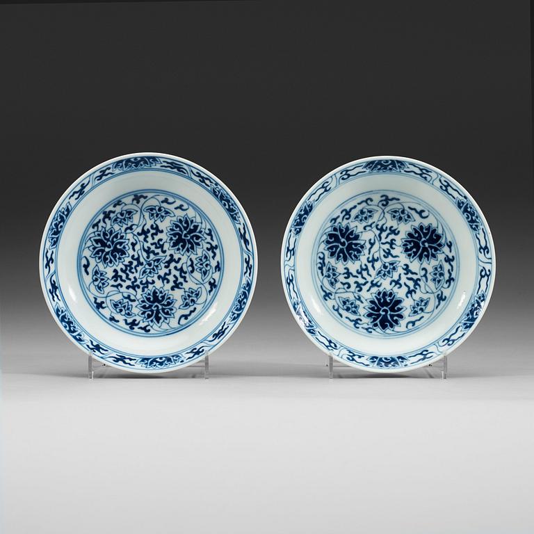 A pair of blue and white lotus dishes, Qing dynasty, Guangxu mark and of period (1874-1908).