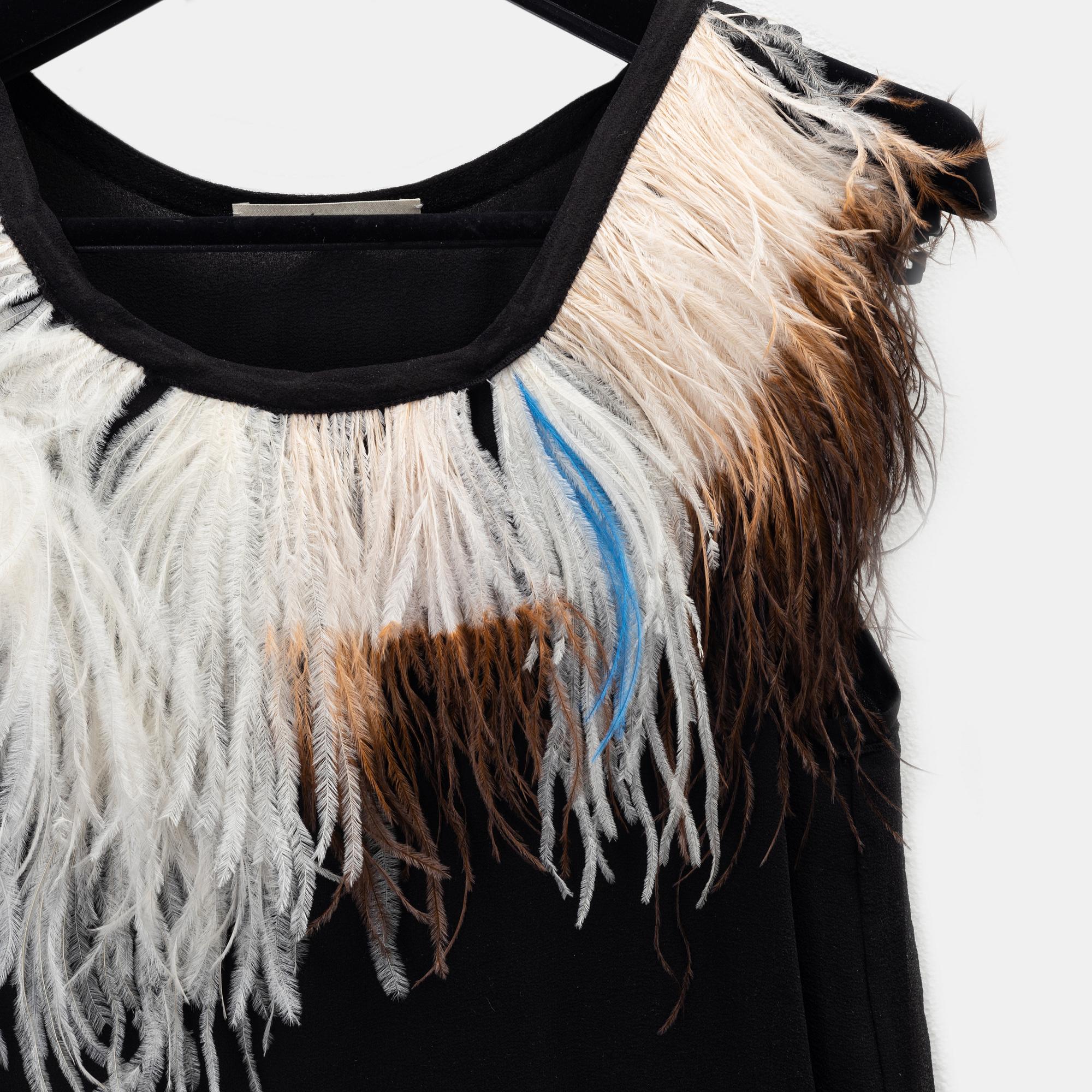 Céline, a silk and feather top, size 34.