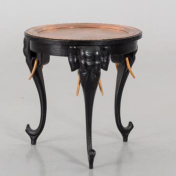 An early 20th Century smoking table, wood and copper.