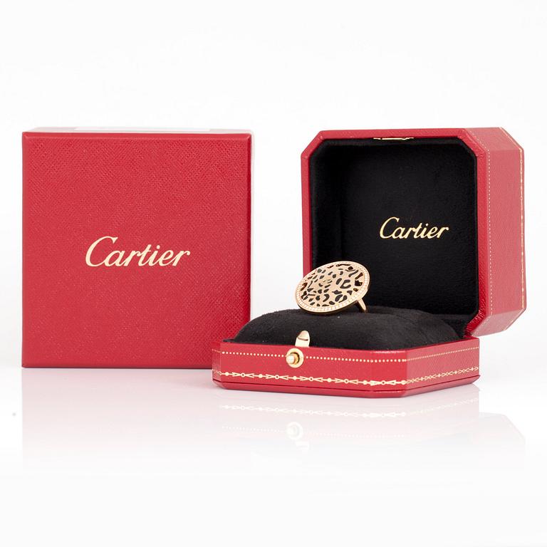 RING, Cartier "Panthère de Cartier" med briljantslipade diamanter, svart lack och en markisslipad tsavoritgranat.