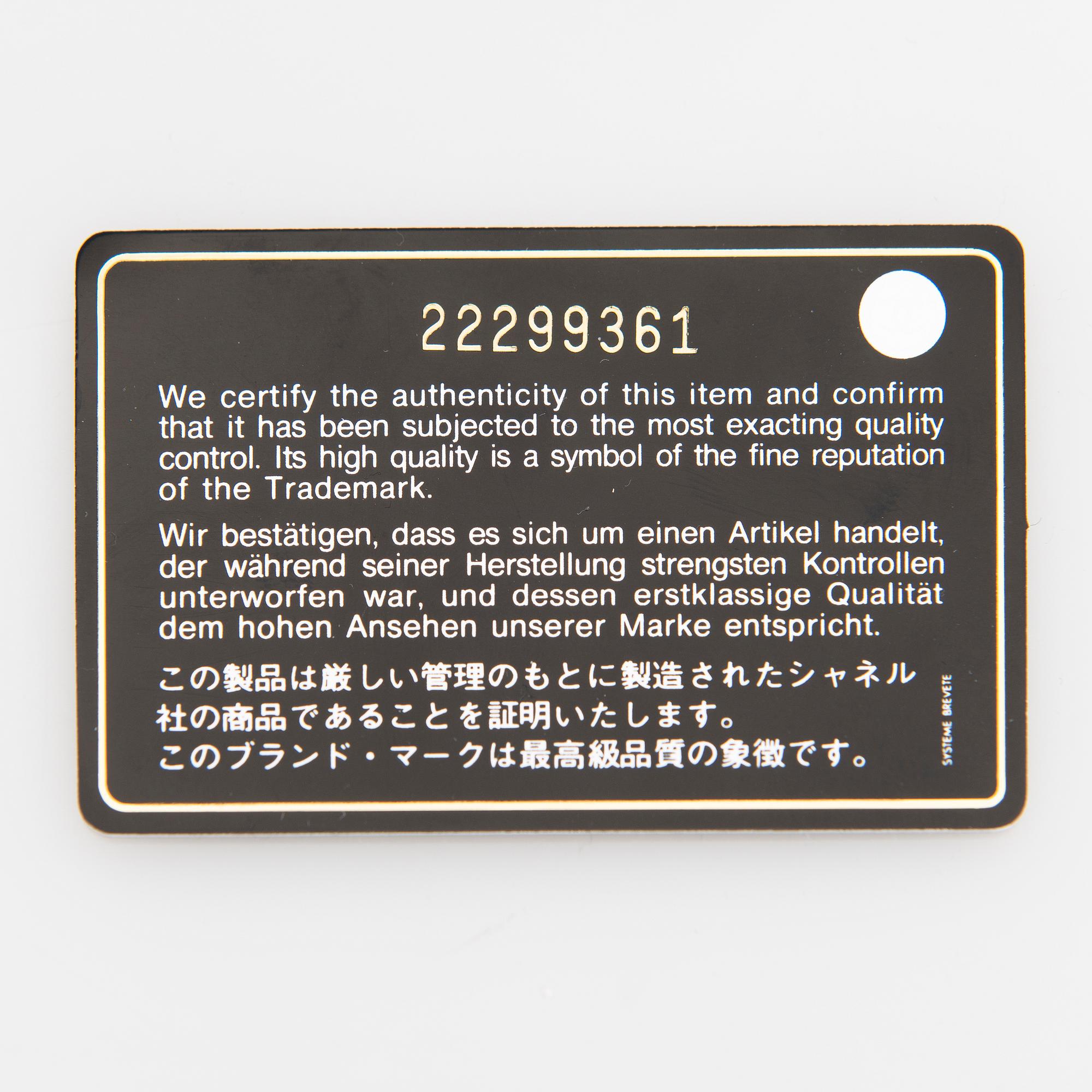 CHANEL, A Large Black Leather Shopping Bag.