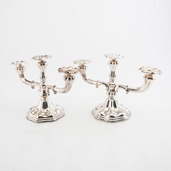 A Swedish 20th century pair of silver candelabras mark of CG Hallberg Stockholm 1935.