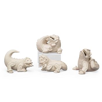 117. Wilhelm Kåge, a set of 4 stoneware figures of 'dragon puppies' Gustavsberg, Sweden 1940's.