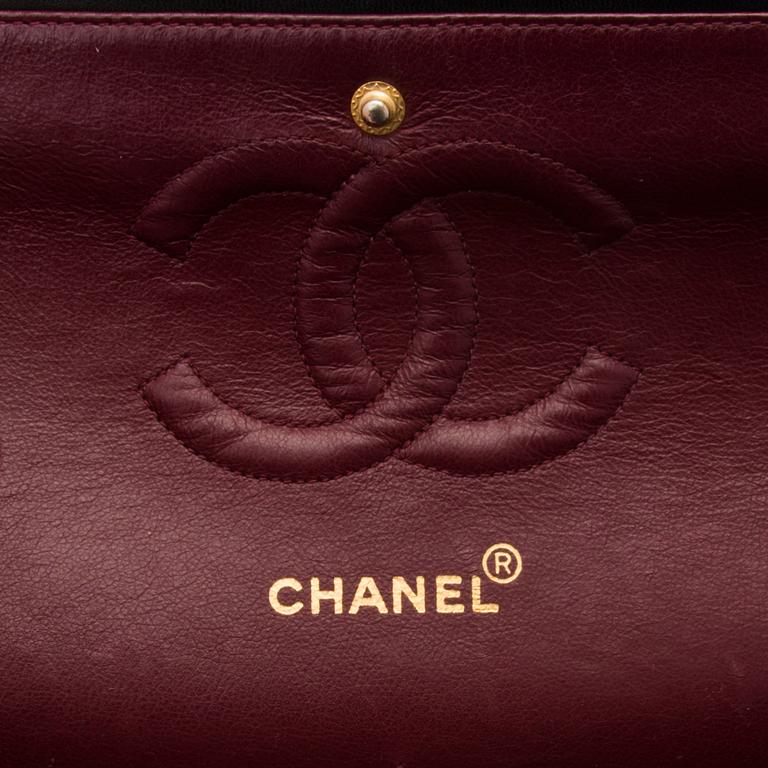 A Black Double Flap Bag.