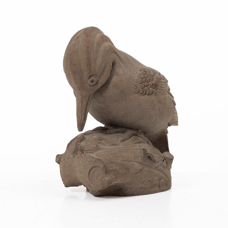 Tyra Lundgren, a stoneware sculpture of a woodpecker, executed in her own studio.