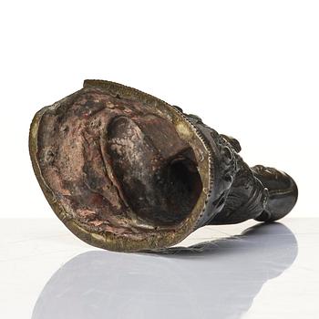 A Tibetan bronze sculpture of a Lama, 18th/19th century.