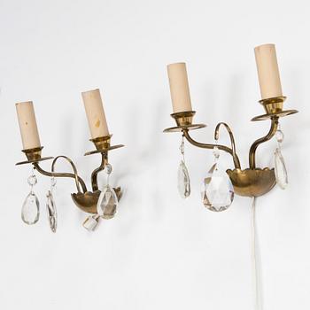 Four of mid-20th century wall sconces.