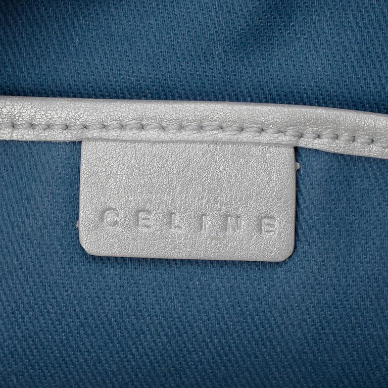 CÉLINE, a monogram canvas shoulder bag and wallet.