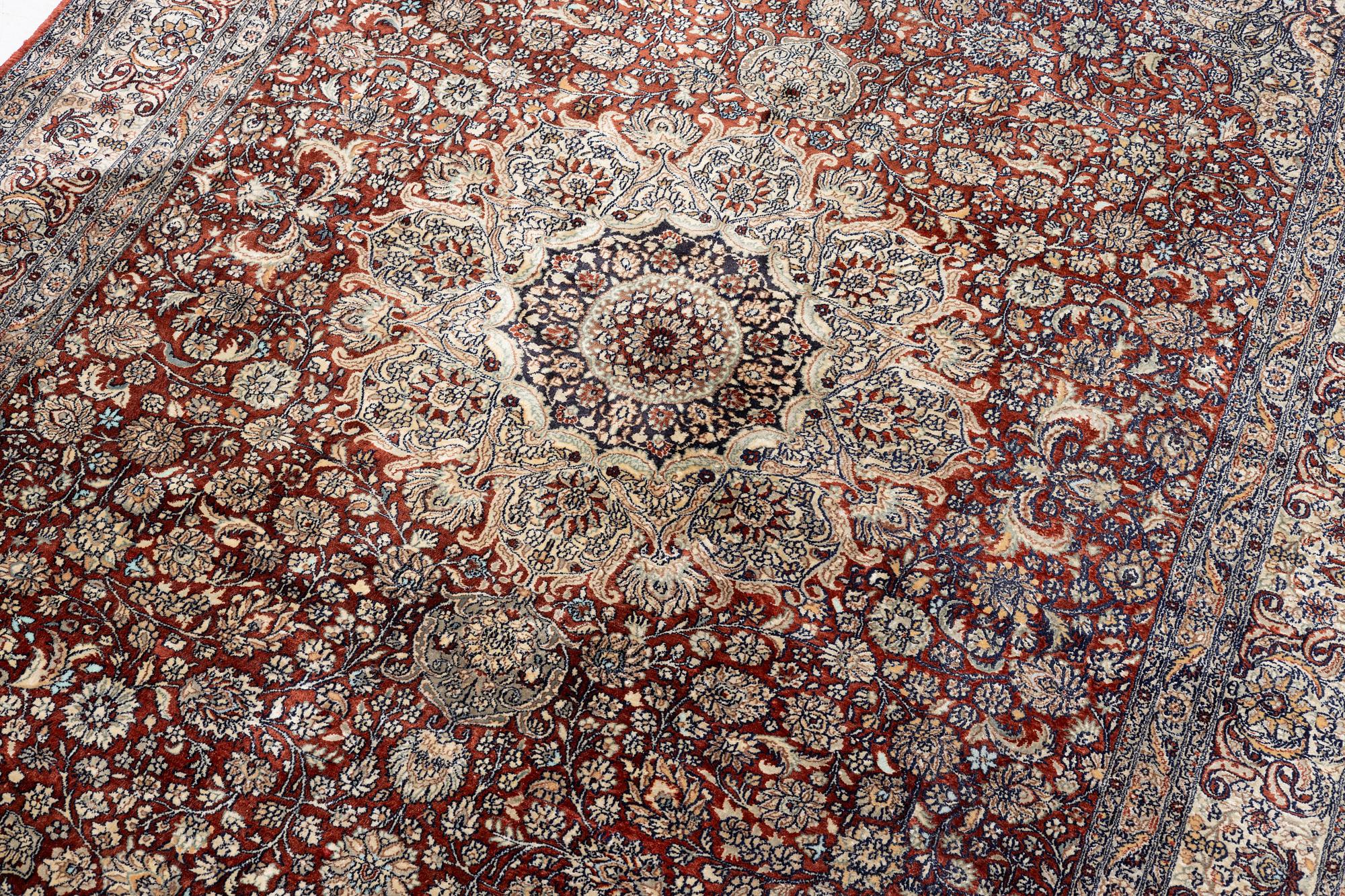 Carpet, part silk, approx. 240 x 158 cm.