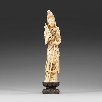 566. A partly tinted carved ivory figure of the female warrior Mulan, Qing Dynasty, 19th Century.