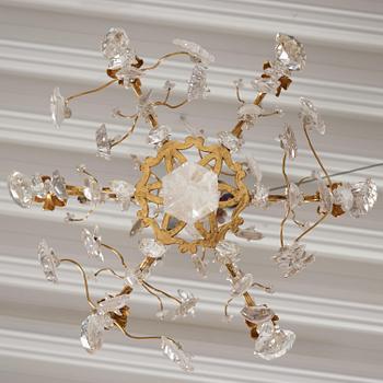 A French Louis XV-style six-branch gilt-bronze, rock crystal and amethyst chandelier, 19th century.